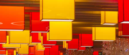 Square colored lamps on the ceilingの写真素材