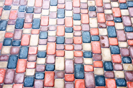 Abstract colorful background of sidewalk tiles - Sidewalk tile as a background for advertisingの写真素材