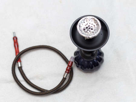Black hookah on a white backgroundの写真素材