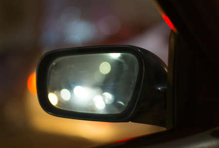 Inside a car with bokeh cork lights at night for backgroundの写真素材