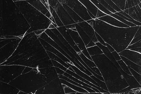 Broken glass on a black background, object background design textureの写真素材