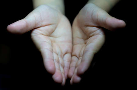 Ramadan kareem concept: Black and white prayer hands open two empty hands with palms up to pray Godの写真素材