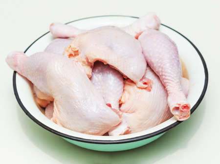 Chicken meat on a large pelvisの写真素材