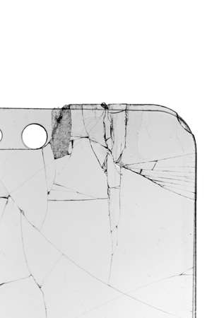 broken safety glass for smartphone on white backgroundの写真素材