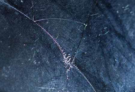 Broken glass on a black background, object background design textureの写真素材