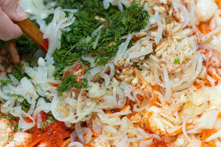 Prepare a cabbage salad and move with a spoonの写真素材