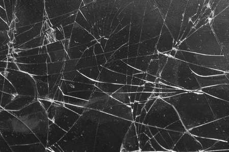 Broken glass on a black background, object background design textureの写真素材