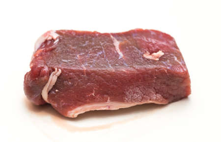 slices of raw meat on a white backgroundの写真素材
