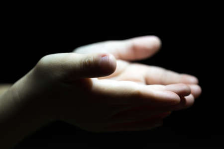 Ramadan kareem concept: Black and white prayer hands open two empty hands with palms up to pray Godの写真素材
