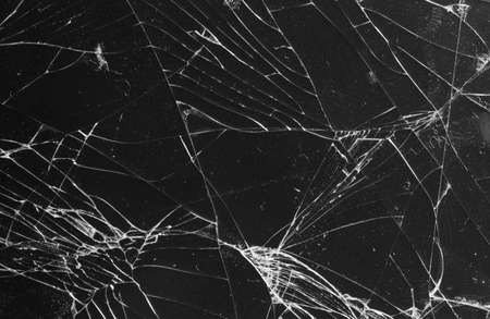 Broken glass on a black background, object background design textureの写真素材