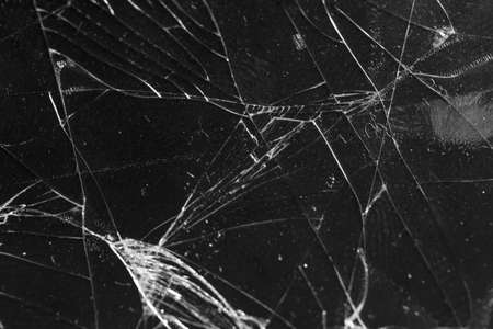 Broken glass on a black background, object background design textureの写真素材