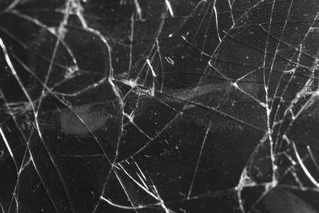 Broken glass on a black background, object background design textureの写真素材