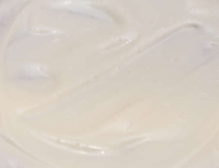 milk cream background on the surface of a sweet cakeの写真素材