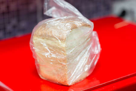 Sliced bread in a plastic bagの写真素材