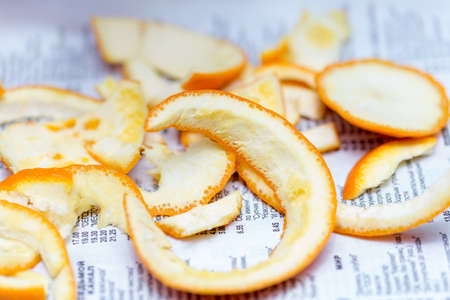 orange peel on paper backgroundの写真素材