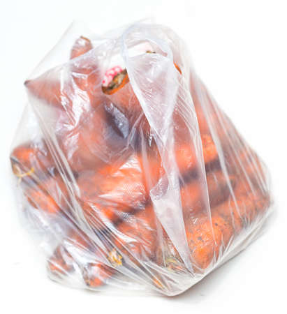 carrots in pack on a white backgroundの写真素材