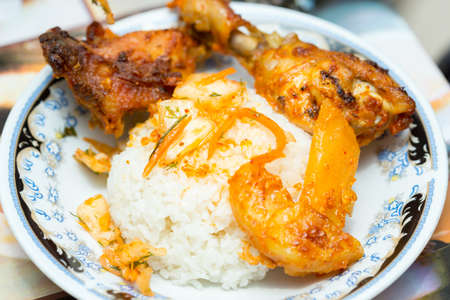 deep fried chicken legs with potatoesの写真素材