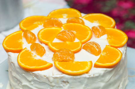 fruit cake with milk cream and fruitの写真素材