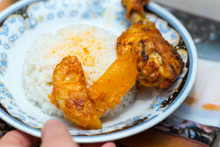 deep fried chicken legs with potatoesの写真素材