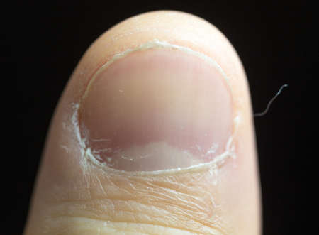 thumb up on black backgroundの写真素材