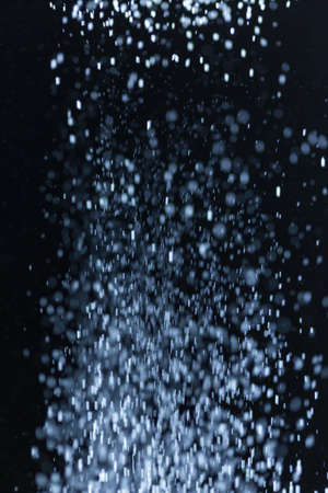 flour on black backgroundの写真素材