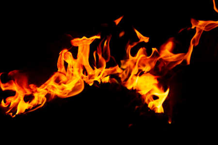 Flame of fire on a black backgroundの写真素材