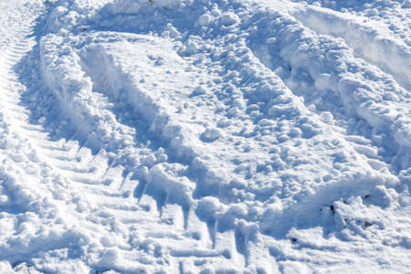tire tracks on snowの写真素材