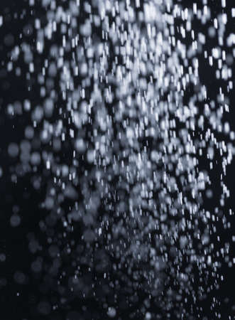 flour on black backgroundの写真素材