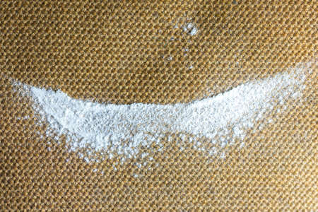 wheat flour in brown backgroundの写真素材