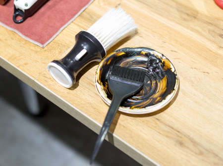 Hairdressing tools hair dye brush on the tableの写真素材