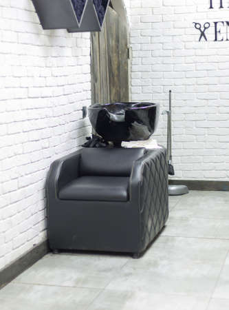 black sink to wash customers hair in hairdressingの写真素材