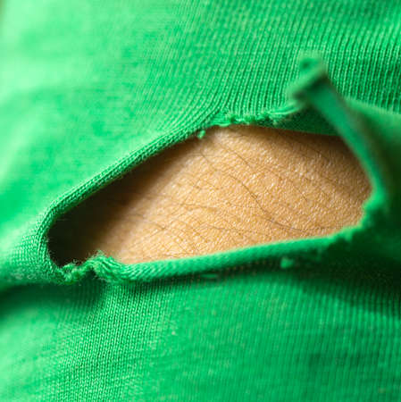 torn green dress macroの写真素材