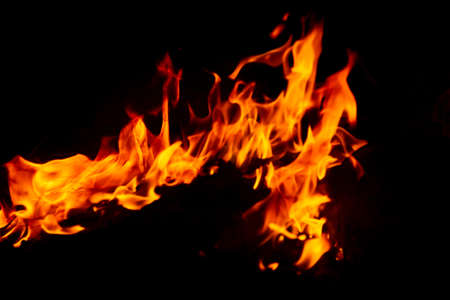 Flame of fire on a black backgroundの写真素材