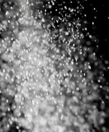 flour on black backgroundの写真素材
