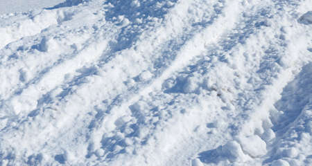 tire tracks on snowの写真素材