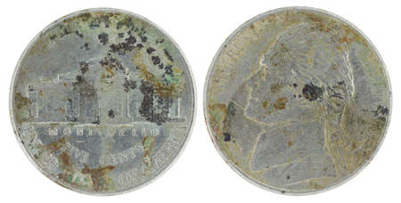 Five American cents (both parties of a coin, on a white background)の写真素材