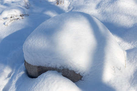 Winter landscape with snow stoneの写真素材