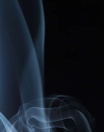 Abstract white smoke on black backgroundの写真素材