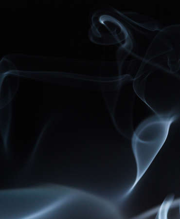 Abstract white smoke on black backgroundの写真素材