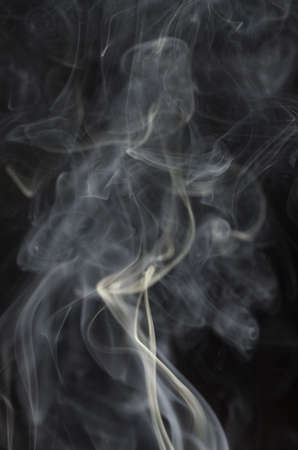 Abstract white smoke on black backgroundの写真素材