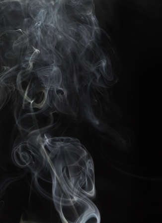 Abstract white smoke on black backgroundの写真素材