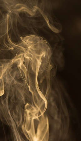 Abstract white smoke on black backgroundの写真素材