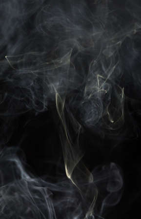 Abstract white smoke on black backgroundの写真素材