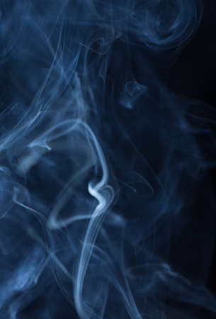 Abstract white smoke on black backgroundの写真素材