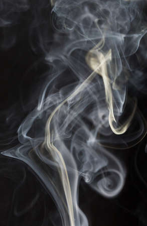 Abstract white smoke on black backgroundの写真素材