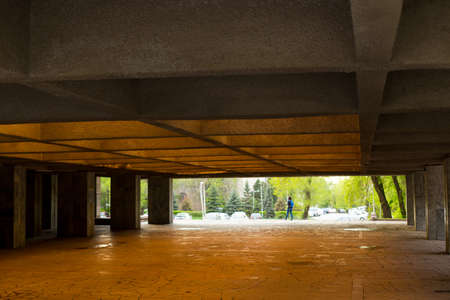 Empty, dark parking at the building in the cityの写真素材
