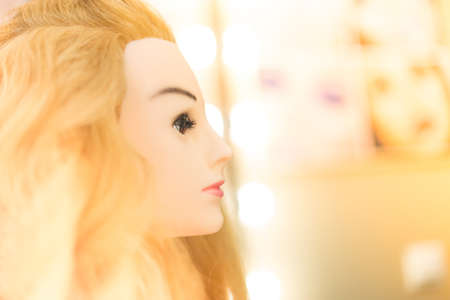 Training hairstyles on a mannequinの写真素材