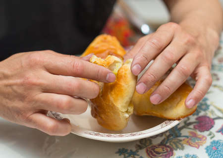 man eats hot cakes (samsa)の写真素材