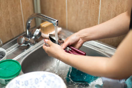 woman washing dishesの写真素材
