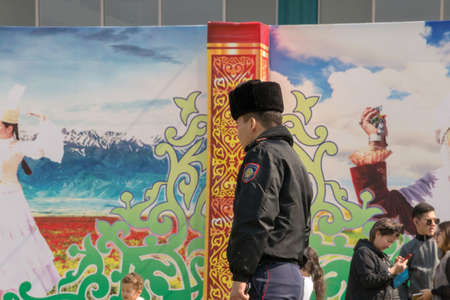 March 22, 2019 Almaty, Kazakhstan. Law enforcement agencies keep order at the stadium during the celebration of the Nauryz holidayのeditorial素材